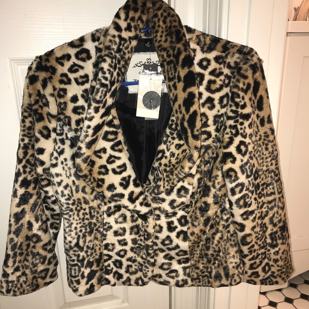 Small fur jacket or “cover up”